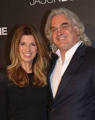 Paul Greengrass (R) and Joanna Greengrass attend the French premiere of the film Jason Bourne in Paris on July 12, 2016.  PAR20160712707 DAVIDxSILPA