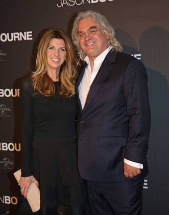 Paul Greengrass (R) and Joanna Greengrass attend the French premiere of the film Jason Bourne in Paris on July 12, 2016.  PAR20160712708 DAVIDxSILPA