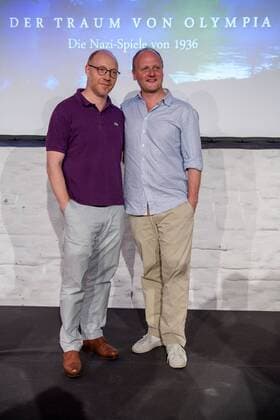 Koeln Hauptdarsteller Simon Schwarz und Christian Hockenbrink (rechts) bei der Erstauffuehrung von Der Traum von Olympia ? Die Nazi-Spiele von 1936 am 12.07.2016, Copyright: Schueler Eibner-Pressefoto EP_JSE