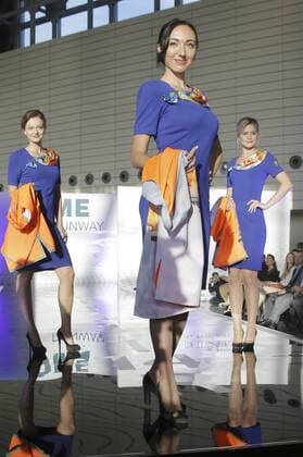 MOSCOW REGION, RUSSIA - JULY 12, 2016: Saratov Airlines employees showcase clothes during the 2016 DME Runway fashion show marking International Flight Attendant Day at Domodedovo International Airport. Mikhail Metzel TASS  TS029C69