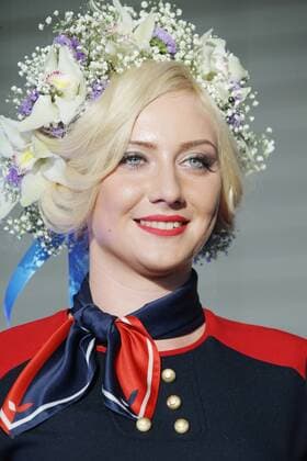 MOSCOW REGION, RUSSIA - JULY 12, 2016: An Azur Air employee showcases clothes during the 2016 DME Runway fashion show marking International Flight Attendant Day at Domodedovo International Airport. Mikhail Metzel TASS  TS029C6F