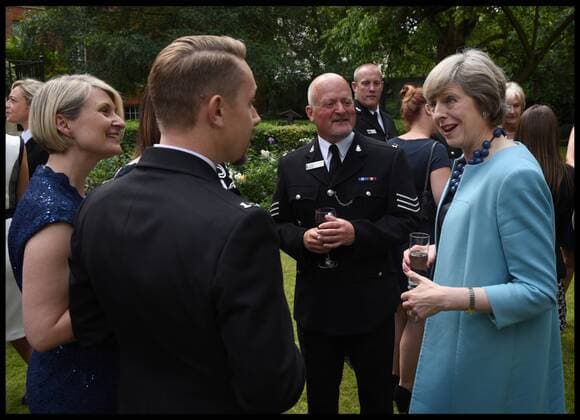 . 14 07 2016. London, United Kingdom. Prime Minister- Police Bravery Awards. The Prime Minister Theresa May meets PC Sean Cannon at a reception for the Police Bravery Award in the garden of No10 Downing Street.  xAndrewxParsonsx xi-Imagesx IIM-13174-0019
