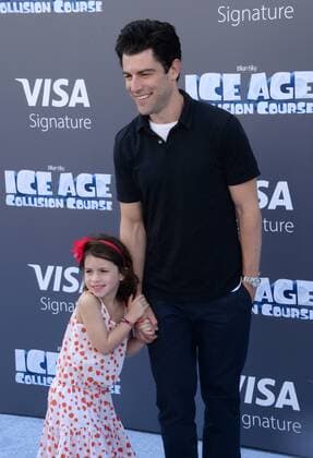 Cast member Max Greenfield, the voice of Roger in the animated motion picture sci-fi comedy Ice Age: Collision Course and his daughter Lily attend the premiere of the film at the Zanuck Theater on the 20th Century Fox Studios lot in Los Angeles on July 16, 2016. Storyline: Scrat s epic pursuit of his elusive acorn catapults him outside of Earth, where he accidentally sets off a series of cosmic events that transform and threaten the planet.  LAP2016071659 JIMxRUYMEN