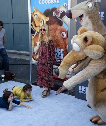 Fashion designer Rachel Zoe looks on as her sons Skyler Morrison Berman (L) and Kaius Jagger Berman react to movie characters during the premiere of the animated motion picture sci-fi comedy Ice Age: Collision Course at the Zanuck Theater on the 20th Century Fox Studios lot in Los Angeles on July 16, 2016. Storyline: Scrat s epic pursuit of his elusive acorn catapults him outside of Earth, where he accidentally sets off a series of cosmic events that transform and threaten the planet.  LAP2016071662 JIMxRUYMEN