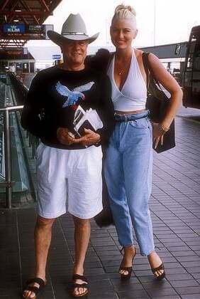 Sept. 30, 2010 - New York, New York, U.S. - C N 13432.TONY CURTIS AND JILL VANDENBERG AT HEATHROW AIRPORT. TONYCURTISRETRO - ZUMAta1_