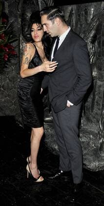 Aug. 4, 2010 - London, Great Britain - Amy Winehouse and Reg Traviss at the Shaka Zulu Bar and Restaurant Launch Party at Shaka Zulu at Stables Market on August 4, 2010 in London. Picture by Can Nguyen LFI  - ZUMAl60_