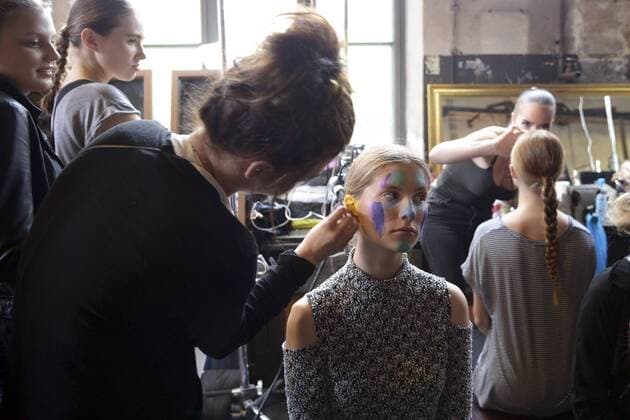 HELSINKI, July 22, 2016 -- Models prepare for a show during the Helsinki Fashion Week in Helsinki, Finland, on July 22, 2016. The first two fashion shows of the Helsinki Fashion Week 2016 were held on Friday at the original site of the Finnish State Aircraft Factory, which was built in 1928. )(yy) FINLAND-HELSINKI-CATWALK SHOW-OLD AIRCRAFT FACTORY SergeixStepanov 