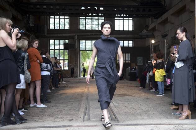 HELSINKI, July 22, 2016 -- Models display the latest collection of South Korean Soulpot Studio designed by Sujinn Kim during the Helsinki Fashion Week in Helsinki, Finland, on July 22, 2016. The first two fashion shows of the Helsinki Fashion Week 2016 were held on Friday at the original site of the Finnish State Aircraft Factory, which was built in 1928. )(yy) FINLAND-HELSINKI-CATWALK SHOW-OLD AIRCRAFT FACTORY SergeixStepanov 