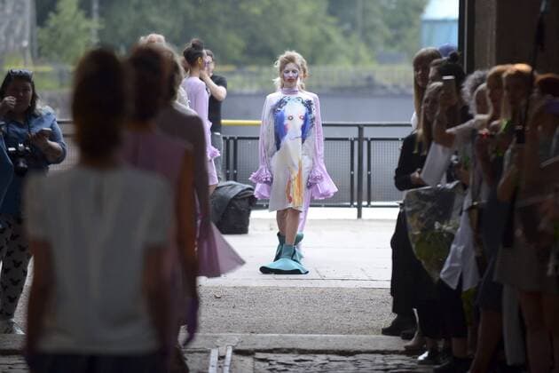 HELSINKI, July 22, 2016 -- Models display the latest collection of Russian fashion designer Sergey Bondarev during the Helsinki Fashion Week in Helsinki, Finland, on July 22, 2016. The first two fashion shows of the Helsinki Fashion Week 2016 were held on Friday at the original site of the Finnish State Aircraft Factory, which was built in 1928. )(yy) FINLAND-HELSINKI-CATWALK SHOW-OLD AIRCRAFT FACTORY SergeixStepanov 