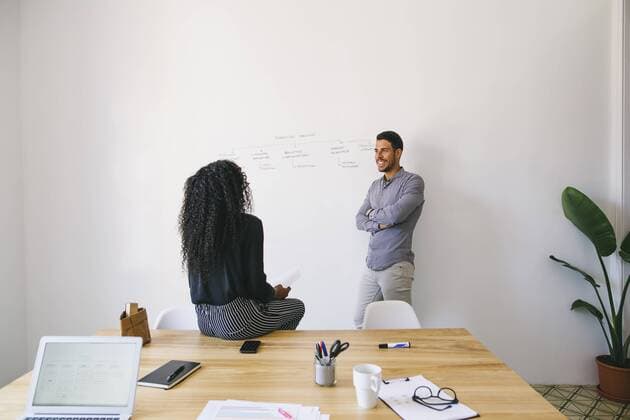 Young businessman and woman preparing meeting in office model released Symbolfoto property released  EBSF001435