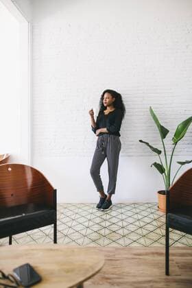 Young businesswoman standing in office model released Symbolfoto property released  EBSF001457