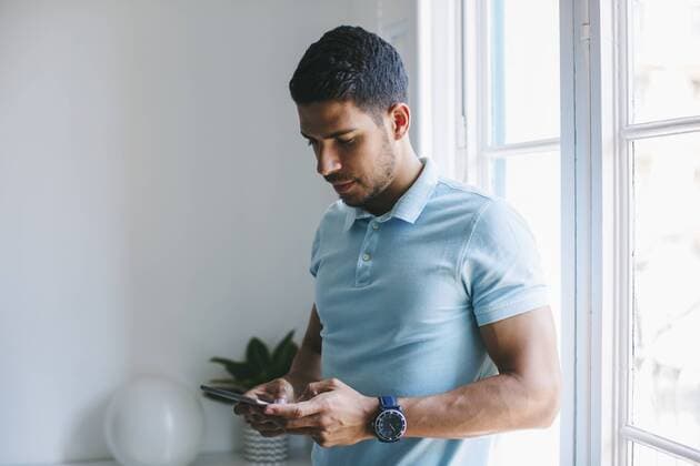 Young businessman in office using digital tablet model released Symbolfoto property released  EBSF001511