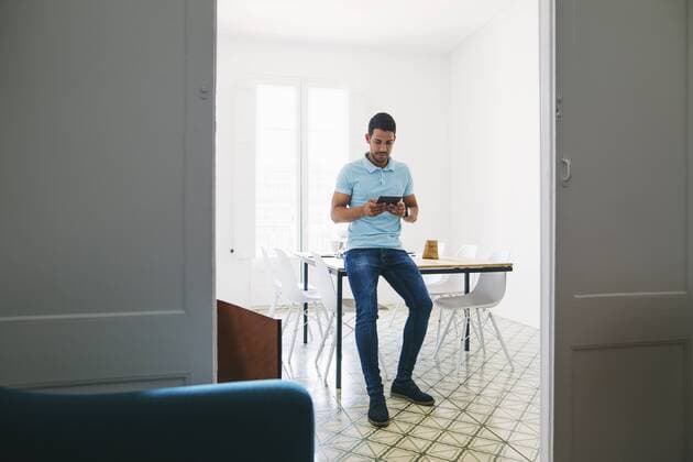 Young businessman in office using digital tablet model released Symbolfoto property released  EBSF001515