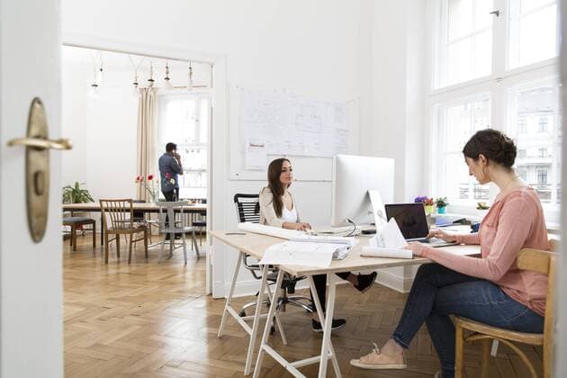 Creative professionals working in office model released Symbolfoto property released  FKF001858