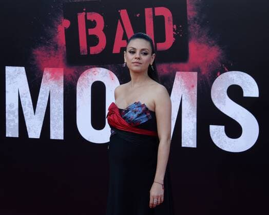 Cast member Mila Kunis attends the premiere of the motion picture comedy Bad Moms at Mann Village Theater in the Westwood section of Los Angeles on July 26, 2016. Storyline: When three overworked and under-appreciated moms are pushed beyond their limits, they ditch their conventional responsibilities for a jolt of long overdue freedom, fun, and comedic self-indulgence.  LAP2016072603 JIMxRUYMEN