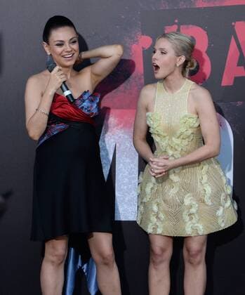 Cast members Mila Kunis (L) and Kristen Bell attend the premiere of the motion picture comedy Bad Moms at Mann Village Theater in the Westwood section of Los Angeles on July 26, 2016. Storyline: When three overworked and under-appreciated moms are pushed beyond their limits, they ditch their conventional responsibilities for a jolt of long overdue freedom, fun, and comedic self-indulgence.  LAP2016072640 JIMxRUYMEN