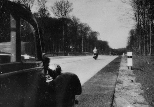 Automobile parked on the newly constructed autobahn. The Autobahn is the federal controlled-access highway system in Germany. The system began to be highly developed by the Nazis under Adolf Hitler s leadership. WHA  !ACHTUNG AUFNAHMEDATUM GESCHÄTZT! Copyright: WHA UnitedArchivesWHA_046_0145