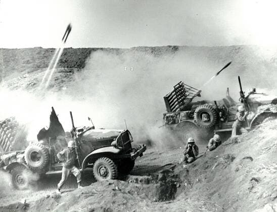 Photograph of International harvest trucks at Iwo Jima after navy barrage rockets hit. Dated 1945 WHA  !ACHTUNG AUFNAHMEDATUM GESCHÄTZT! Copyright: WHA UnitedArchivesWHA_047_0560