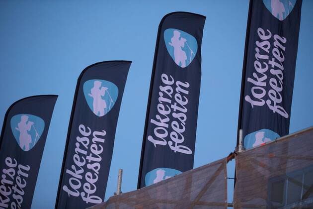 The Lokerse Feesten logo on flags on the first day of the 42nd edition of the Lokerse Feesten music festival in the city center of Lokeren, Friday 05 August 2016. This year s edition of the festival takes place from 5 to 14 August.  NICOLASxMAETERLINCK 04904212