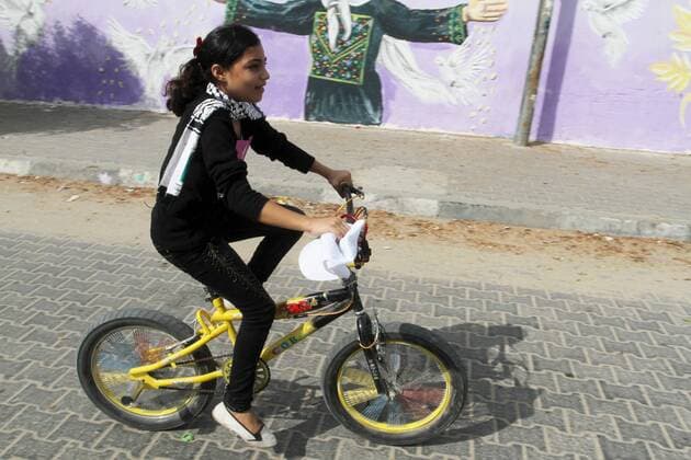 August 7, 2016 - Rafah, Gaza Strip, Palestinian Territory - Palestinian children take part in the bicycles marathon to demand their right to play and break the siege on Gaza strip, in Rafah in the southern Gaza Strip. on August 7, 2016 Rafah Palestinian Territory - ZUMAap3_