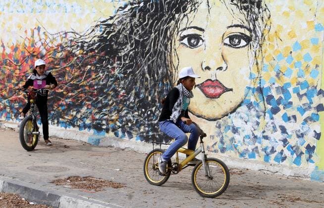 August 7, 2016 - Rafah, Gaza Strip, Palestinian Territory - Palestinian children take part in the bicycles marathon to demand their right to play and break the siege on Gaza strip, in Rafah in the southern Gaza Strip. on August 7, 2016 Rafah Palestinian Territory - ZUMAap3_
