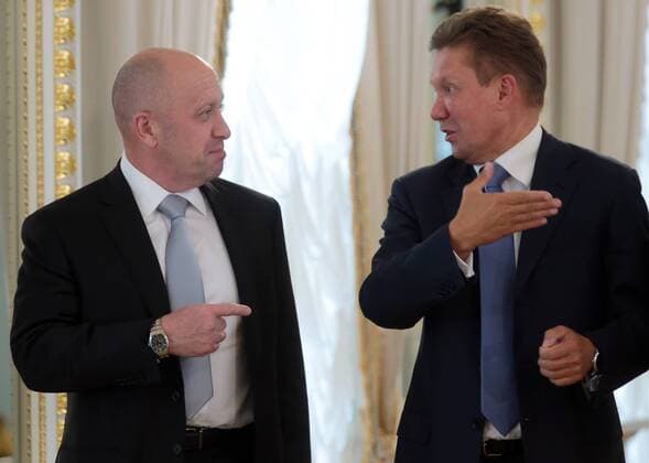 ST PETERSBURG, RUSSIA - AUGUST 9, 2016: Concord Catering general director Yevgeny Prigozhin (L) and deputy chairman of the Board of Directors at Gazprom Alexei Miller at a meeting of Russian and Turkish government officials and business leaders. Mikhail Metzel TASS  TS02C7AD