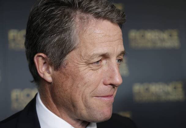 Hugh Grant arrives on the red carpet at the Florence Foster Jenkins New York Premiere at AMC Loews Lincoln Square 13 Theater on August 9, 2016 in New York City.  NYP20160809118 JOHNxANGELILLO