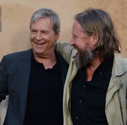 Cast member Jeff Bridges (L) and director David Mackenzie attend the premiere of the motion picture crime drama Hell or High Water at the ArcLight Cinema Dome in the Hollywood section of Los Angeles on August 10, 2016. Storyline: A divorced dad and his ex-con brother resort to a desperate scheme in order to save their family s farm in West Texas.  LAP2016081013 JIMxRUYMEN