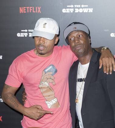 USA: The Get Down premiere in New York Nas and Grandmaster Flash (L) attend The Get Down Netflix original series premier at Lehman Center for performing arts in the Bronx.  LevxRadin