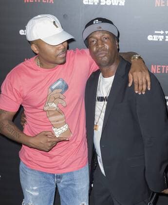 USA: The Get Down premiere in New York Nas and Grandmaster Flash (L) attend The Get Down Netflix original series premier at Lehman Center for performing arts in the Bronx.  LevxRadin
