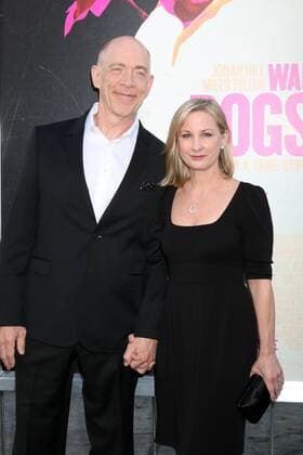 LOS ANGELES - AUG 15: JK Simmons, Michelle Schumacher at the War Dogs Premiere at the TCL Chinese Theater IMAX on August 15, 2016 in Los Angeles, CA  KathyxHutchins
