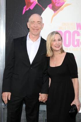 LOS ANGELES - AUG 15: JK Simmons, Michelle Schumacher at the War Dogs Premiere at the TCL Chinese Theater IMAX on August 15, 2016 in Los Angeles, CA  KathyxHutchins