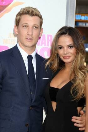 LOS ANGELES - AUG 15: Miles Teller, Keleigh Sperry at the War Dogs Premiere at the TCL Chinese Theater IMAX on August 15, 2016 in Los Angeles, CA  KathyxHutchins