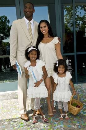 Aug. 28, 2009 - Irvine, California, USA -- KOBE BRYANT and family wait to take some ceremonial photos with local dignitaries at opening ceremonies for the Pretend City Children s Museum. Designed as a small, inter-connected city, the 28,000 square foot museum comprises 15 interactive exhibits, including an art studio, amphitheater, grocery store, farm, doctor s office, police station, construction site, marina and beach. - ZUMAce6_