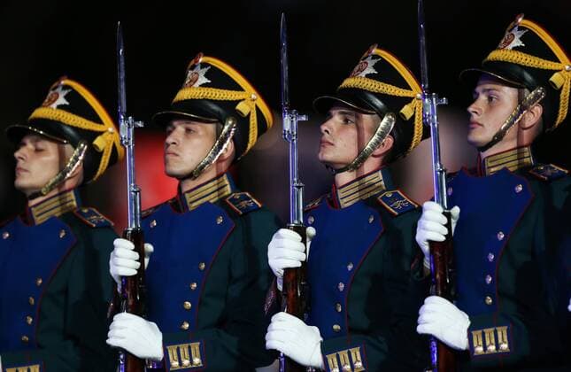 MOSCOW, RUSSIA - AUGUST 27, 2016: Members of the Honor Guard of the Presidential Regiment of Russia perform at the opening of the 9th Spasskaya Tower international military music festival in Moscow s Red Square. Artyom Geodakyan TASS  TS02EEB5