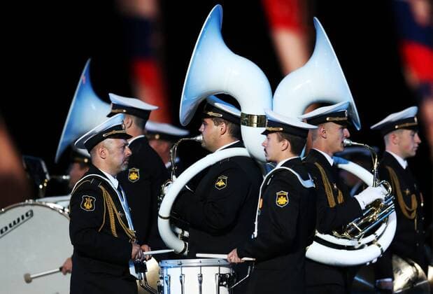 MOSCOW, RUSSIA - AUGUST 27, 2016: Members of the Central Band of the Navy named after N.A. Rimsky-Korsakov of Russia perform at the opening of the 9th Spasskaya Tower international military music festival in Moscow s Red Square. Artyom Geodakyan TASS  TS02EF5D