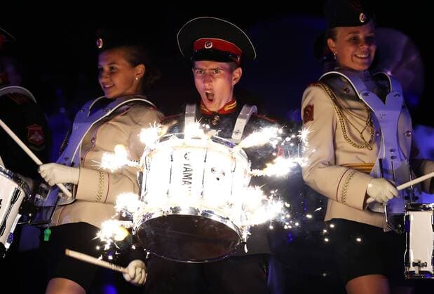 MOSCOW, RUSSIA - AUGUST 27, 2016: Members of the Band of the Moscow Military Music College perform at the opening of the 9th Spasskaya Tower international military music festival in Moscow s Red Square. Artyom Geodakyan TASS  TS02EF68