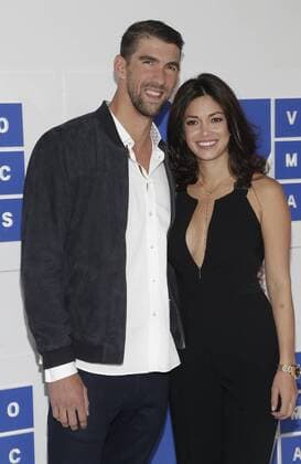 MTV Video Music Awards in New York Michael Phelps and Nicole Johnson arrive on the red carpet with a view of the Empire State Building at the 2016 MTV Video Music Awards at Madison Square Garden in New York City on August 28, 2016. Performers at the 2016 MTV VMA s include Rihanna, Britney Spears, Ariana Grande and Nicki Minaj.  NYP20160828117 JOHNxANGELILLO