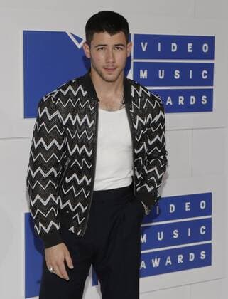 MTV Video Music Awards in New York Nick Jonas arrives on the red carpet at the 2016 MTV Video Music Awards at Madison Square Garden in New York City on August 28, 2016. Performers at the 2016 MTV VMA s include Rihanna, Britney Spears, Ariana Grande and Nicki Minaj.  NYP20160828163 JOHNxANGELILLO