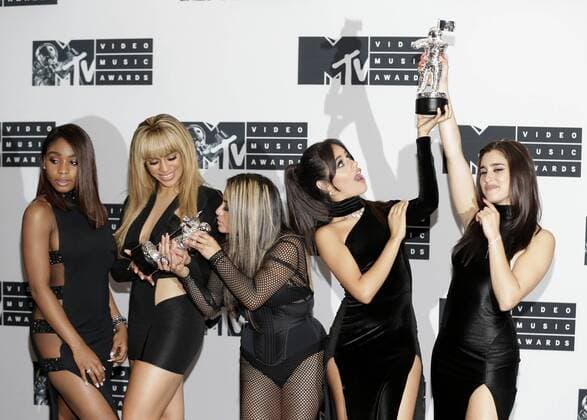 Ally Brooke, Normani Kordei, Dinah Jane, Camila Cabello, and Lauren Jauregui of Fifth Harmony hold their award for best collaboration at the 2016 MTV Video Music Awards at Madison Square Garden in New York City on August 28, 2016. Performers at the 2016 MTV VMA s include Rihanna, Britney Spears, Ariana Grande and Nicki Minaj.  NYP20160828602 JOHNxANGELILLO