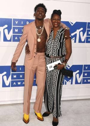 August 28, 2016 - New York, New York, U.S. - Hip hop artist DESIIGNER and his MOTHER attend the arrivals at the 2016 MTV Video Music Awards held at Madison Square Garden. New York U.S. - ZUMAk03_