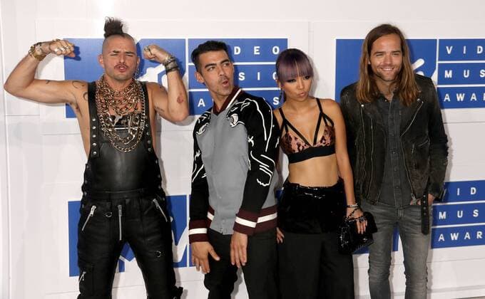 August 28, 2016 - New York, New York, U.S. - DNCE members COLE WHITTLE, JOE JONAS, JINJOO LEE and JACK LAWLESS attend the arrivals at the 2016 MTV Video Music Awards held at Madison Square Garden. New York U.S. - ZUMAk03_