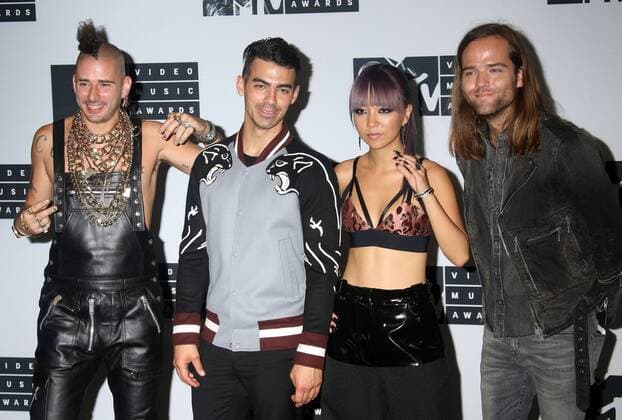 August 28, 2016 - New York, New York, U.S. - Members of DNCE, COLE WHITTLE, JOE JONAS, JINJOO LEE and JACK LAWLESS pose for photos in the press room at the 2016 MTV Video Music Awards held at Madison Square Garden. New York U.S. - ZUMAk03_