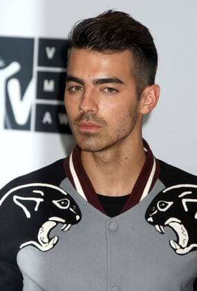 August 28, 2016 - New York, New York, U.S. - Member of DNCE, JOE JONAS poses for photos in the press room at the 2016 MTV Video Music Awards held at Madison Square Garden. New York U.S. - ZUMAk03_