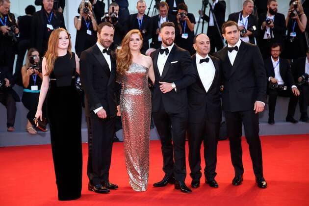 (160902) -- VENICE, Sept. 2, 2016 -- (L-R) Cast members actress Ellie Bamber, director Tom Ford, actress Amy Adams, Actor Aaron Taylor Johnson, actor Jake Gyllenhaal (1st R) arrive for the premiere of the movie Nocturnal Animals in competition at the 73rd Venice Film Festival in Venice, Italy, on Sept. 2, 2016. ) ITALY-VENICE-FILM FESTIVAL-NOCTURNAL ANIMALS-PREMIERE JinxYu 