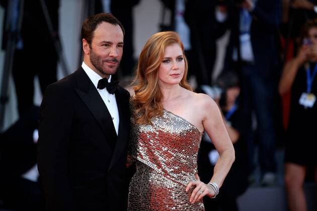 (160902) -- VENICE, Sept. 2, 2016 -- Director Tom Ford (L) and actress Amy Adams arrive for the premiere of the movie Nocturnal Animals in competition at the 73rd Venice Film Festival in Venice, Italy, on Sept. 2, 2016. ) ITALY-VENICE-FILM FESTIVAL-NOCTURNAL ANIMALS-PREMIERE JinxYu 