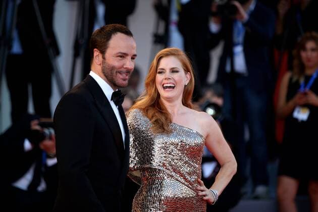 (160902) -- VENICE, Sept. 2, 2016 -- Director Tom Ford (L) and actress Amy Adams arrive for the premiere of the movie Nocturnal Animals in competition at the 73rd Venice Film Festival in Venice, Italy, on Sept. 2, 2016. ) ITALY-VENICE-FILM FESTIVAL-NOCTURNAL ANIMALS-PREMIERE JinxYu 