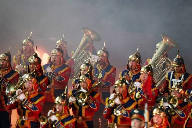 MOSCOW, RUSSIA - SEPTEMBER 4, 2016: The Honour Guard and the Central Orchestra of the Mongolian Armed Forces perform at the closing ceremony of the 9th Spasskaya Tower international military music festival, in Red Square. Artyom Geodakyan TASS  TS02FD20