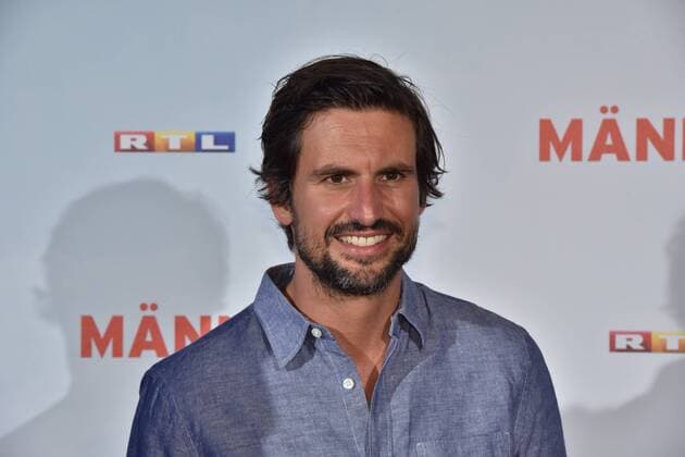 Schauspieler Tom Beck posiert am 06.09.2016 in Köln bei der Premiere des Films Männertag auf dem roten Teppich.