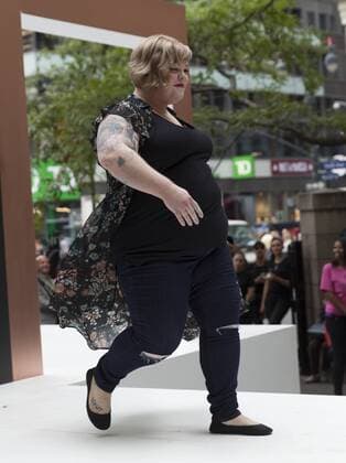 US: New York fashion week Ashley Nell Tipton show Model walks runway for women plus-size collection by Ashley Nell Tipton presented by JCPenney during New York fashion week ss 2017 at Greeley Square, New York.  LevxRadin